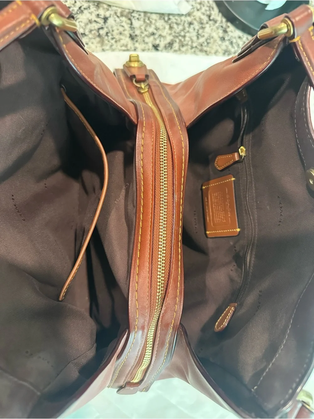 Coach Signature Canvas Shoulder Bag in Brown and Saddle